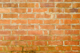 red / orange brick wall background texture photo