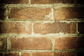 grunge dark old brick wall background texture