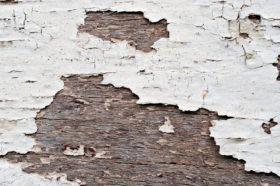 Image of old peeling paint on wood background texture