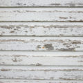 white wood texture of a wall peeling paint