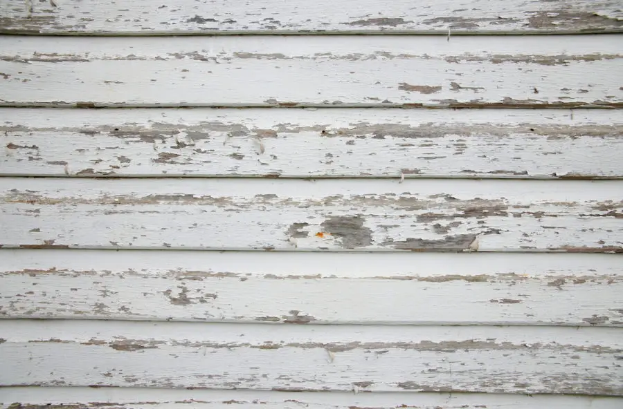 old wood with peeling paint background texture