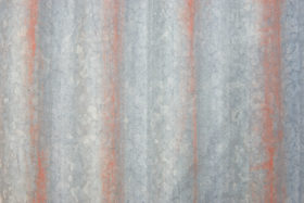 closeup photo of old corrugated iron metal background texture