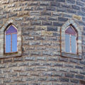 two old windows in the castle tower wall