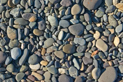 stone texture of beach rocks in the hot sun