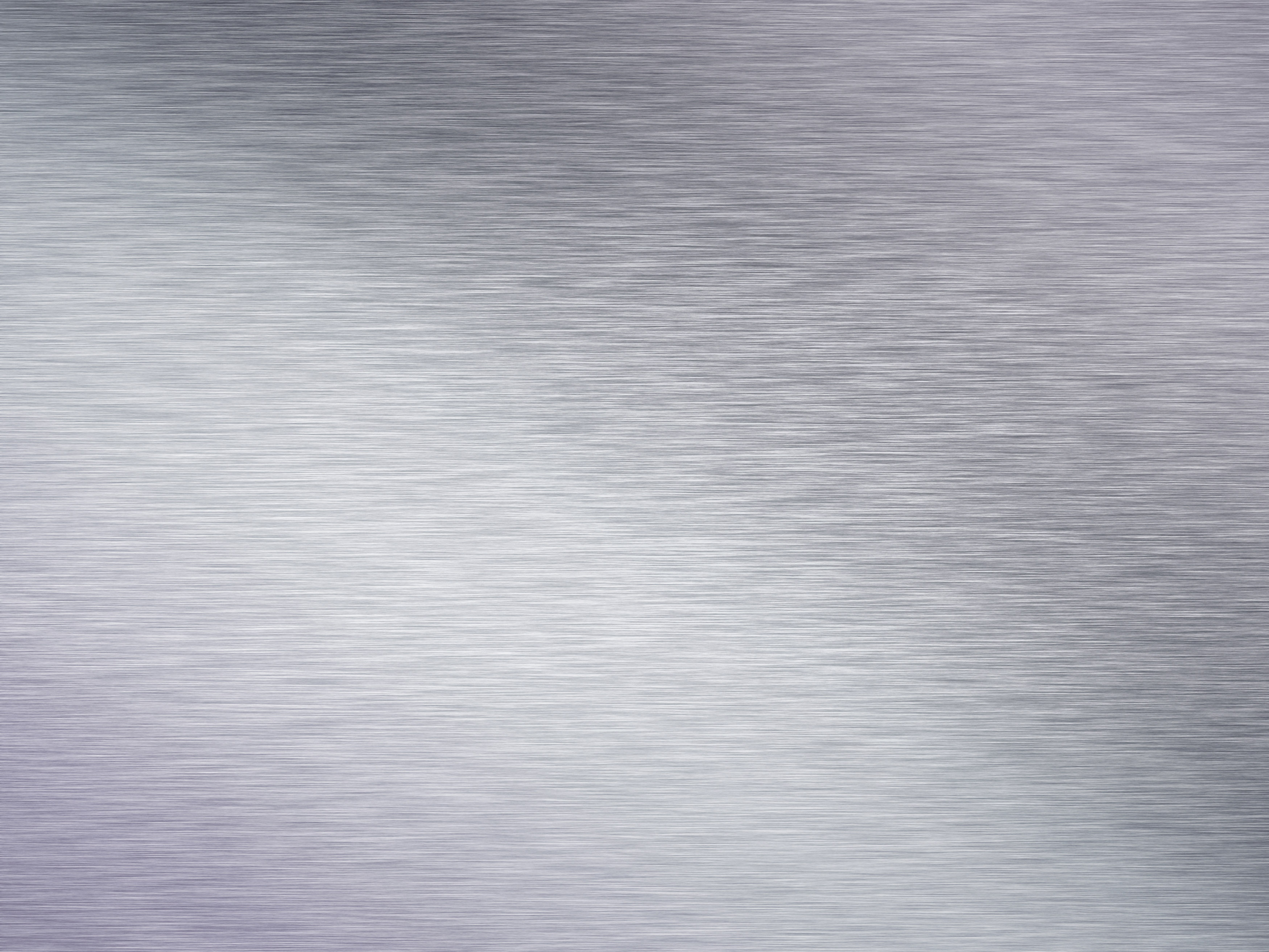 a grey brushed steel or aluminium metal background