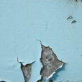 blue peeling paint on metal background texture