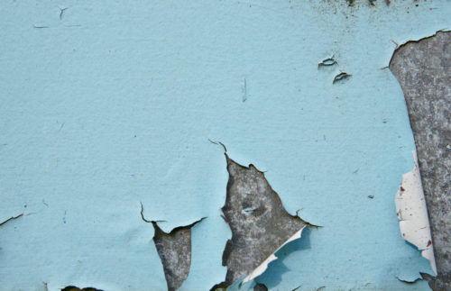 blue peeling paint on metal background texture
