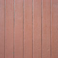 red-ish wooden panelled fence background