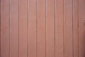 red-ish wooden paneled fence background texture