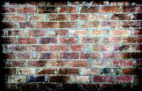 here is an old grungy brick wall texture