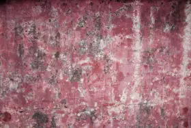 an old worn red concrete grunge wall