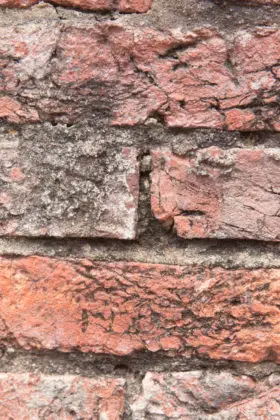 closeup of a old red brick wall old background