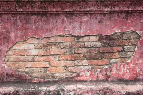 old grungy red brick wall and concrete background texture