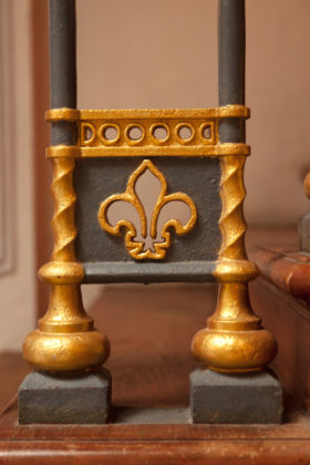 Fleur-de-lis on stair rail