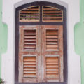 shuttered window in wall background