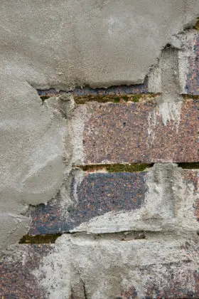 two cement brick wall closeup images