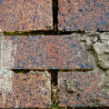 just a grungy brick wall close up