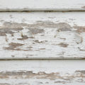 closeup of an old white wooden wall texture