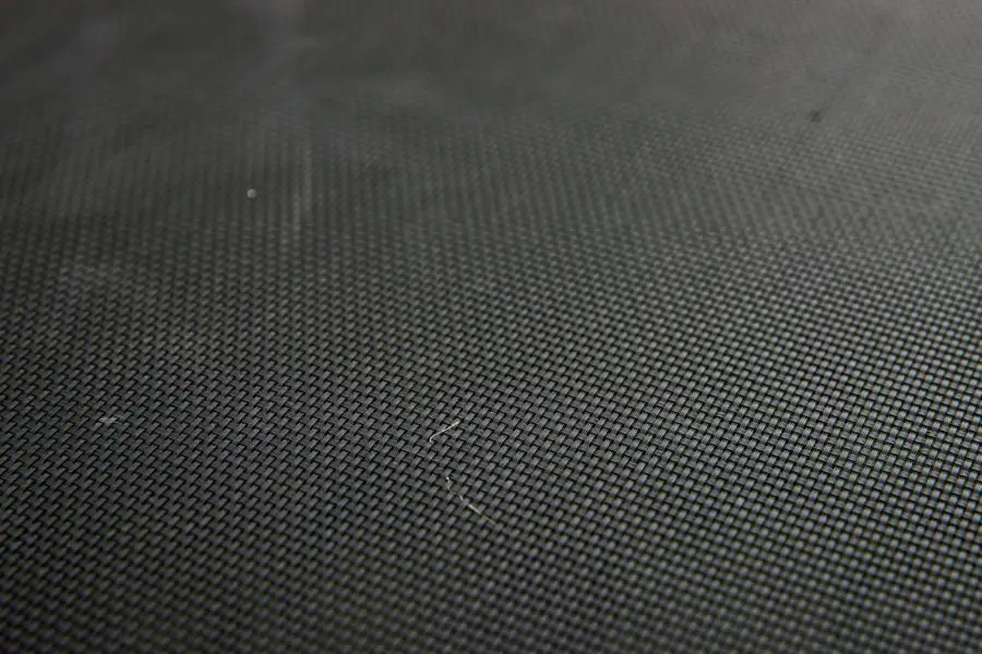 black plastic trampoline mesh background aka carbon fiber texture