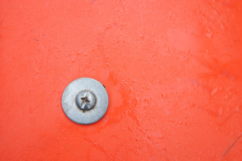 orange plastic with screw