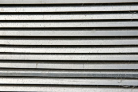 An old metal aluminum vent background texture