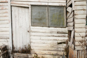 background image of old abandoned building walls and door