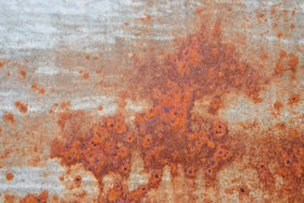 another rusted red metal background