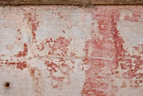 old rough red painted wood background texture