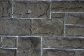 closeup of an old stone brick wall texture