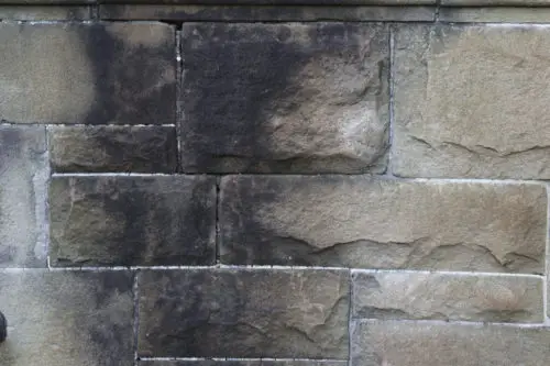 grungy stone brick wall background texture