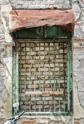 free photo of an old bricked up window in penang