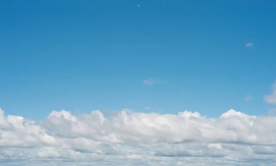 cloud texture of fluffy white heavenly clouds with copyspace