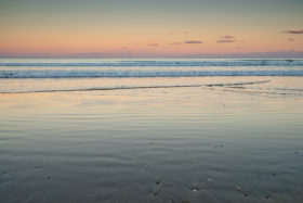 Third beach sunset at coffs harbour stock photo