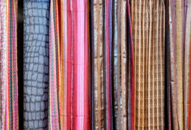 assorted fabric for sale background image