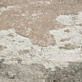 old concrete wall grunge background texture with peeling paint