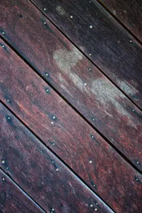 deep stained wooden floor boards texture