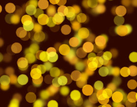 Bright yellow bokeh circles background image