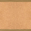 a nice large texture of a cork board with frame