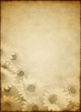 Old paper texture that is worn, faded and has floral print