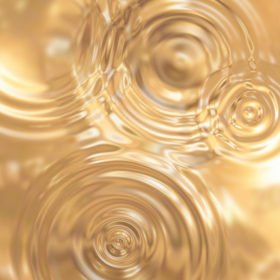 seamless background of ripples in gold metal texture