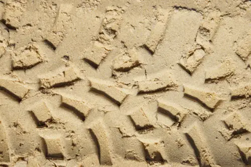 tire tracks in sand texture