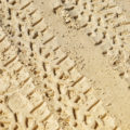 tire tracks in the sand texture