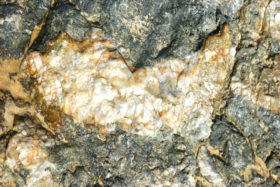 Rock texture with large vein of quartz