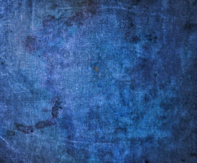 abstract grunge texture on blue fabric