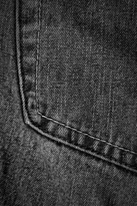 pocket of black denim jeans texture