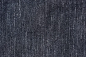 Straight and simple, a black denim background, cloth jeans fabric texture