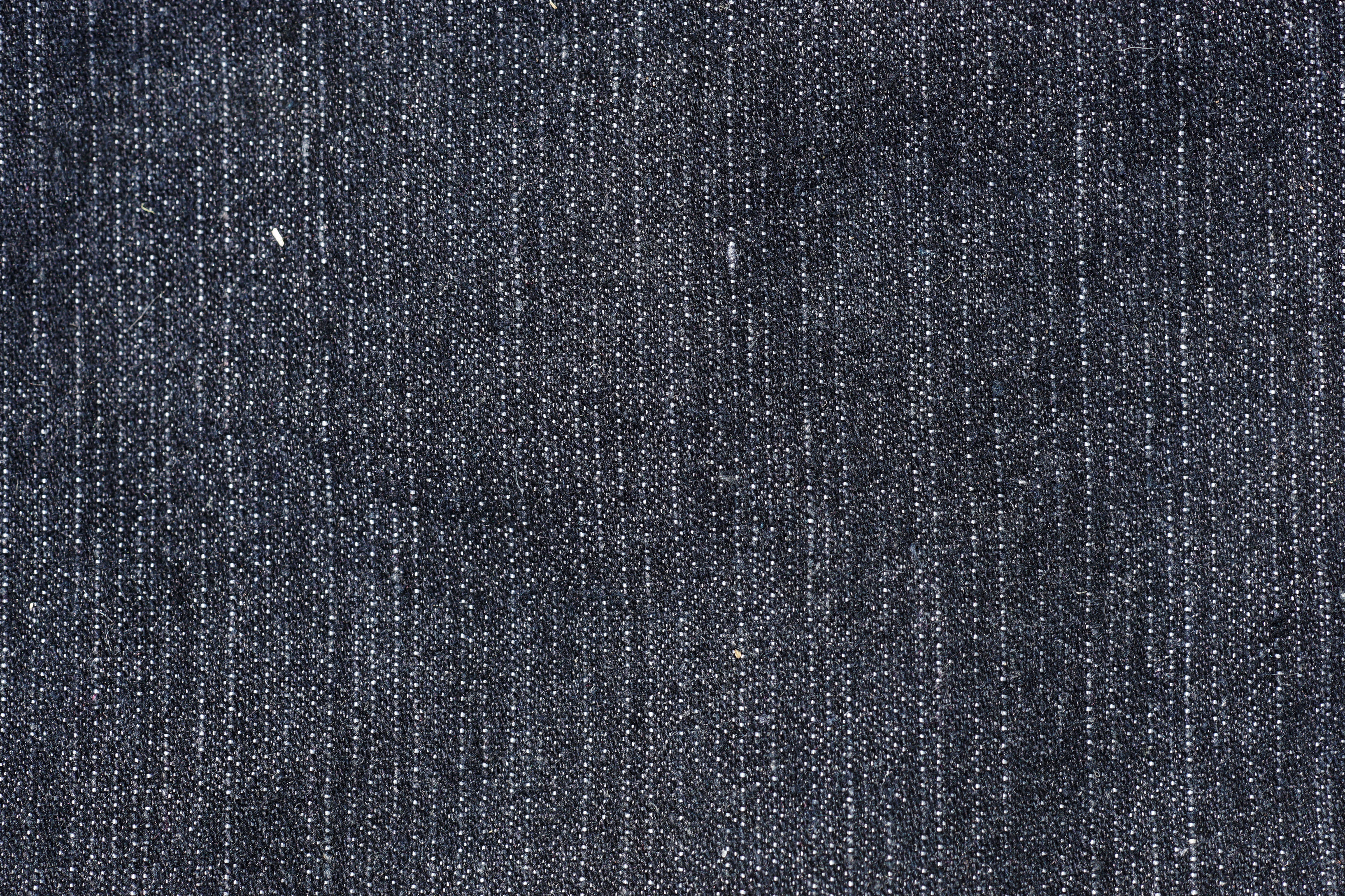 and simple, a black denim background, cloth fabric texture