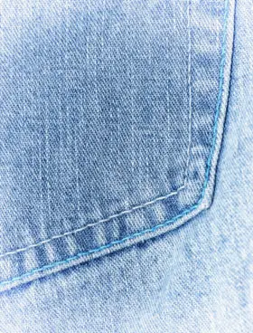 faded pocket of blue jeans denim texture