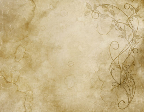 faded and worn floral design on old paper or parchment texture