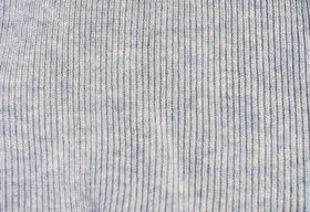 Two grey backgrounds of knit wool fabric textures
